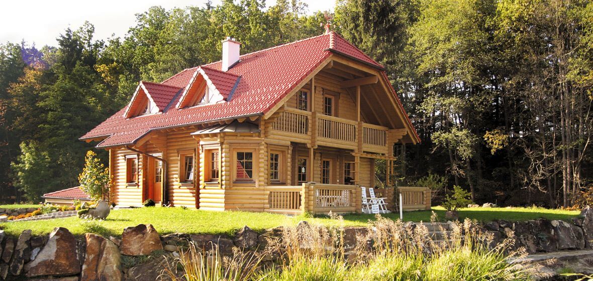 Classic log house with dormer windows